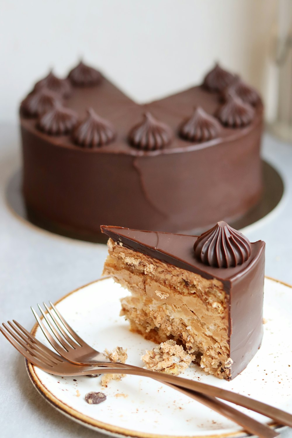 a piece of cake on a plate with a fork