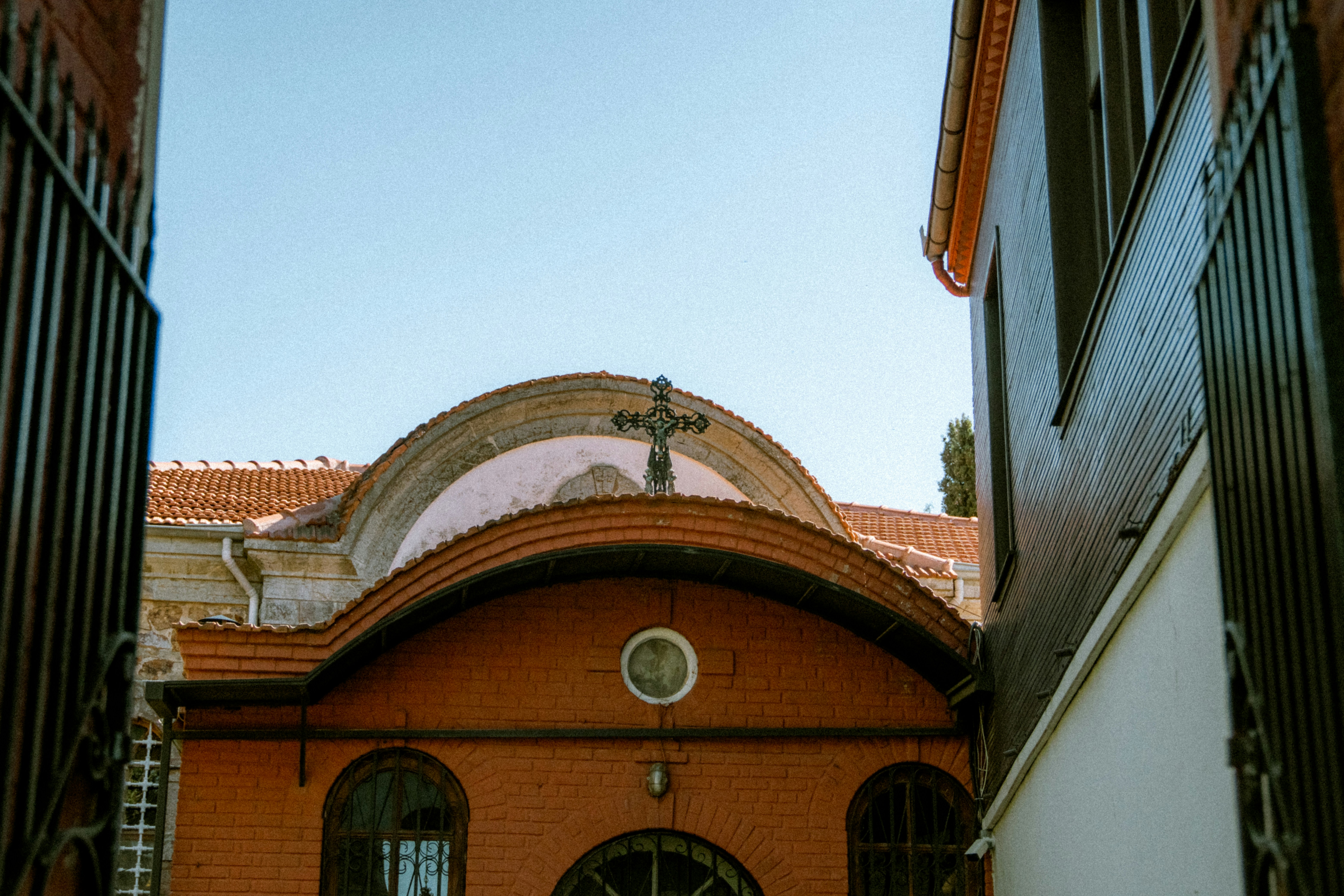 A distinctive public library in the UK with a curved, pre-patinated copper roof that makes a bold architectural statement.