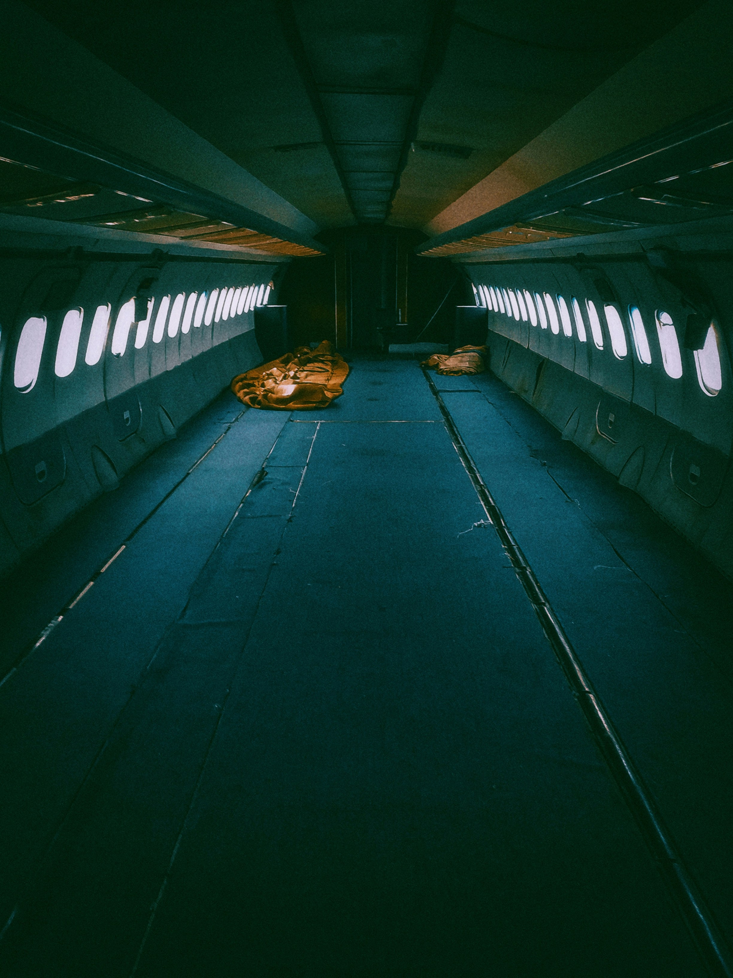 a long hallway with a lot of windows in it