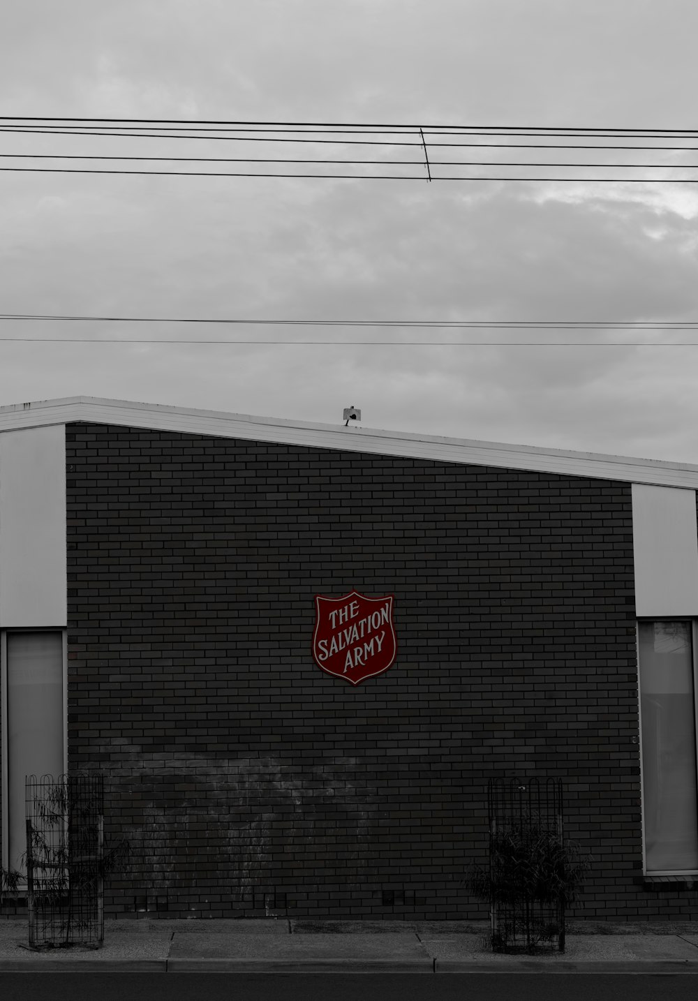 a black and white photo of a brick building