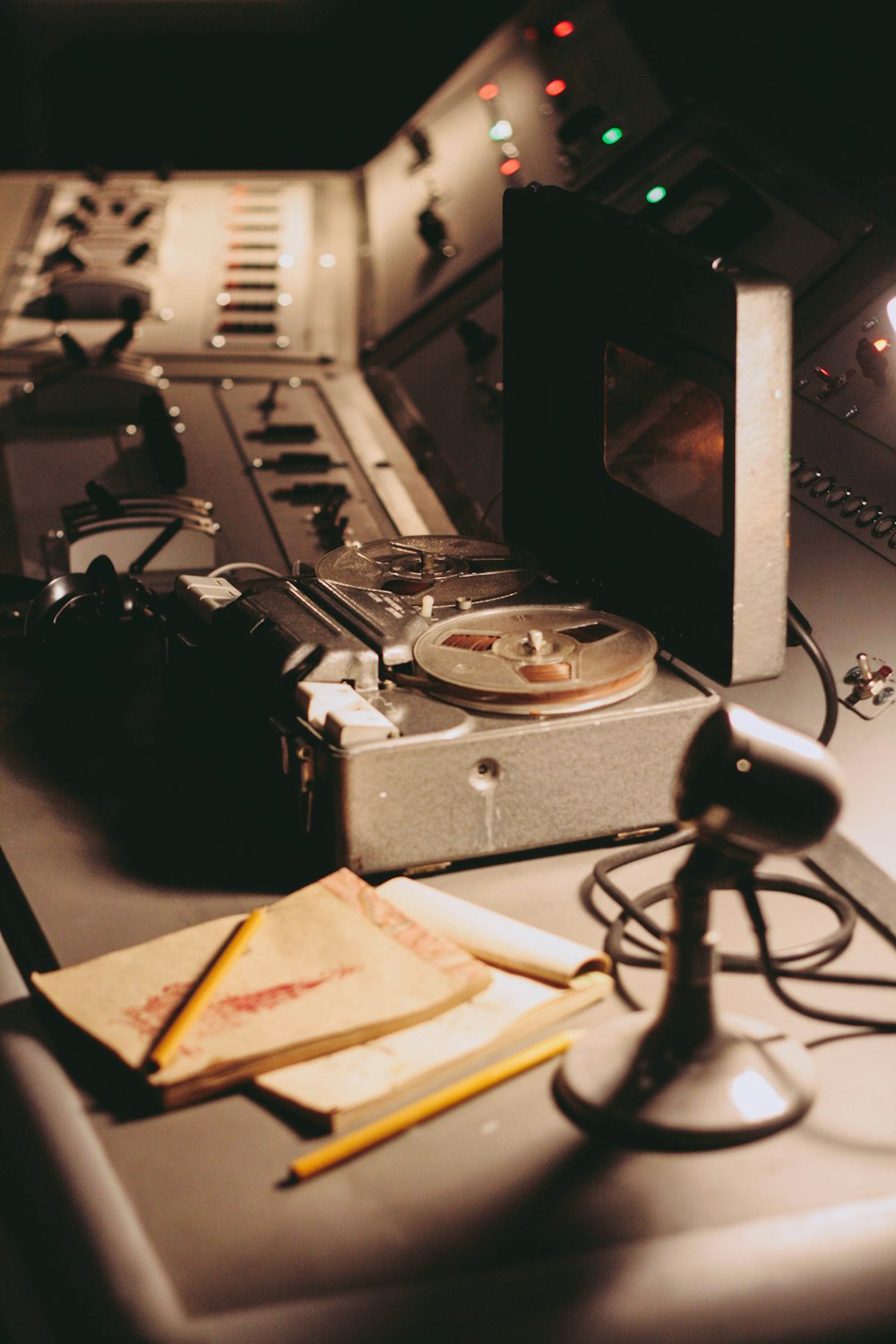 a table with a record player and a microphone