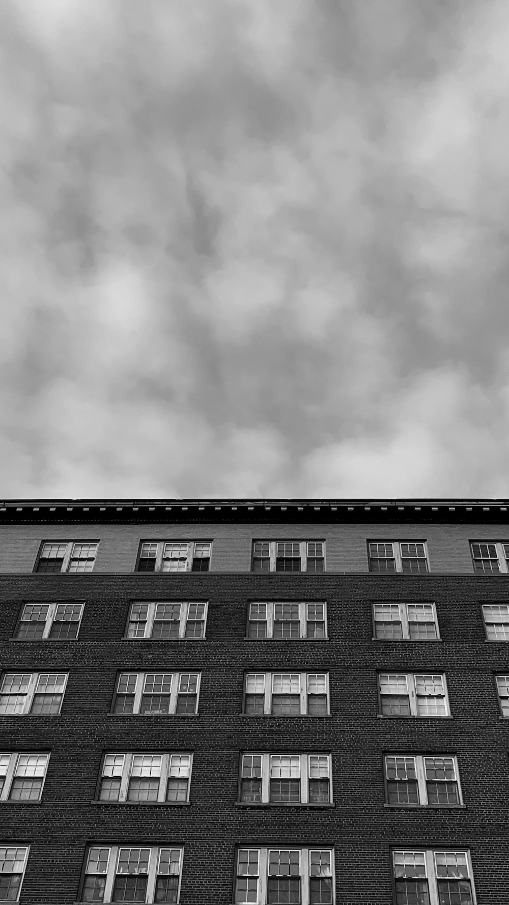 a black and white photo of a tall building