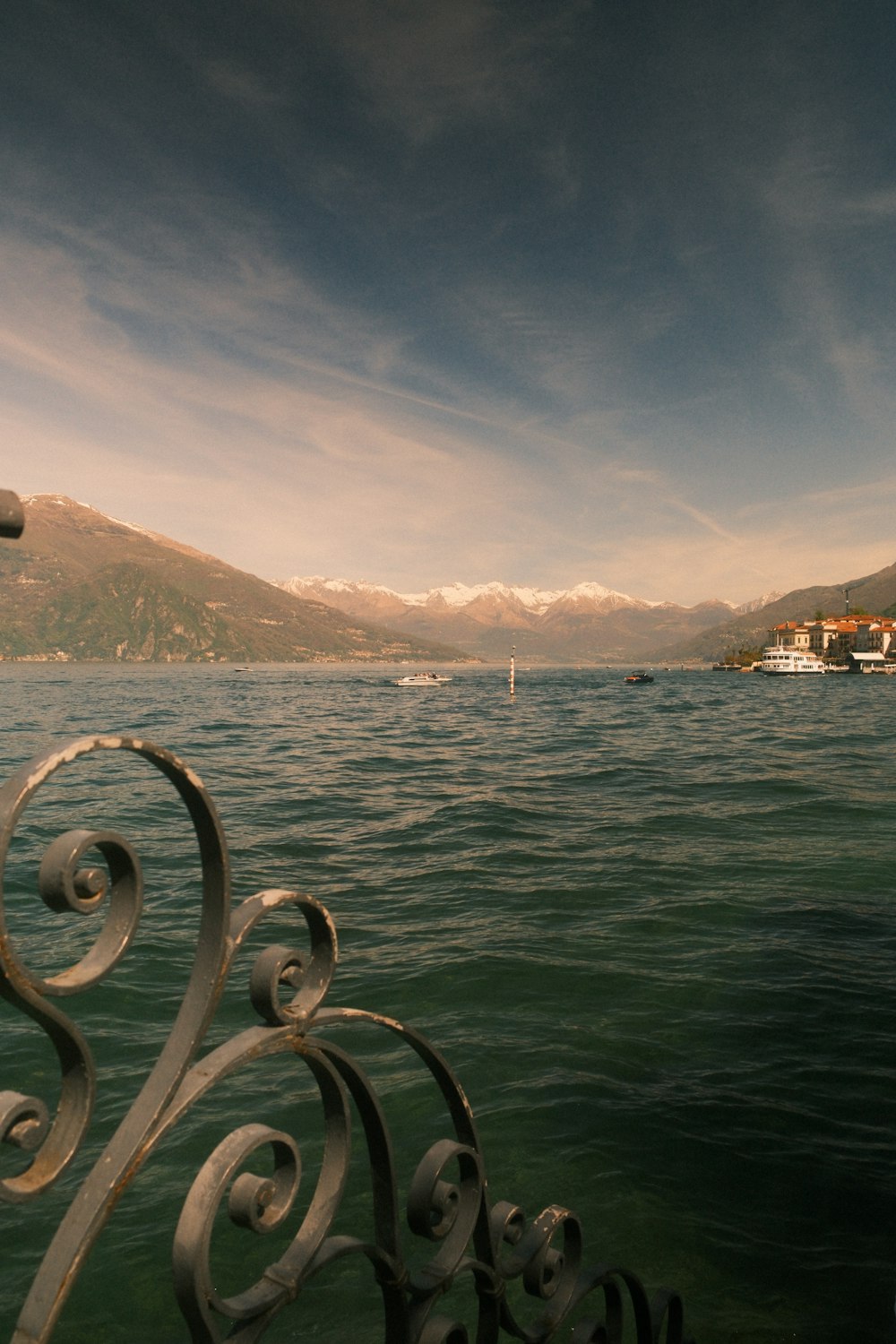 a view of a body of water with mountains in the background