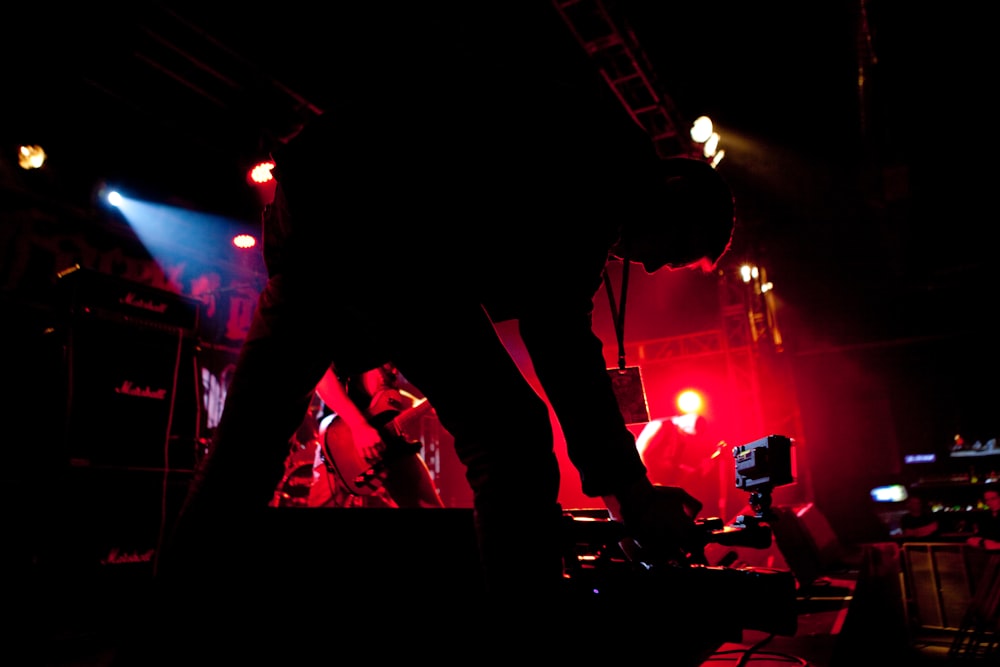 a group of people standing on top of a stage