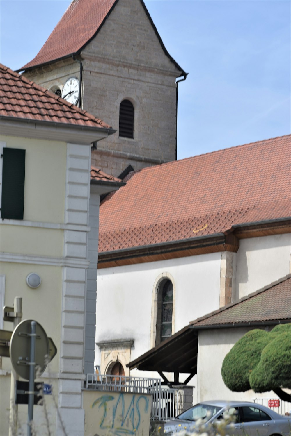 a building with a clock on the front of it