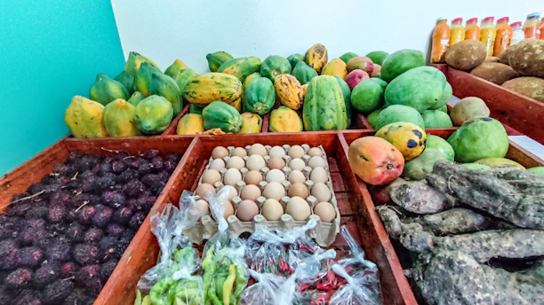 a table filled with lots of different types of fruits and vegetables