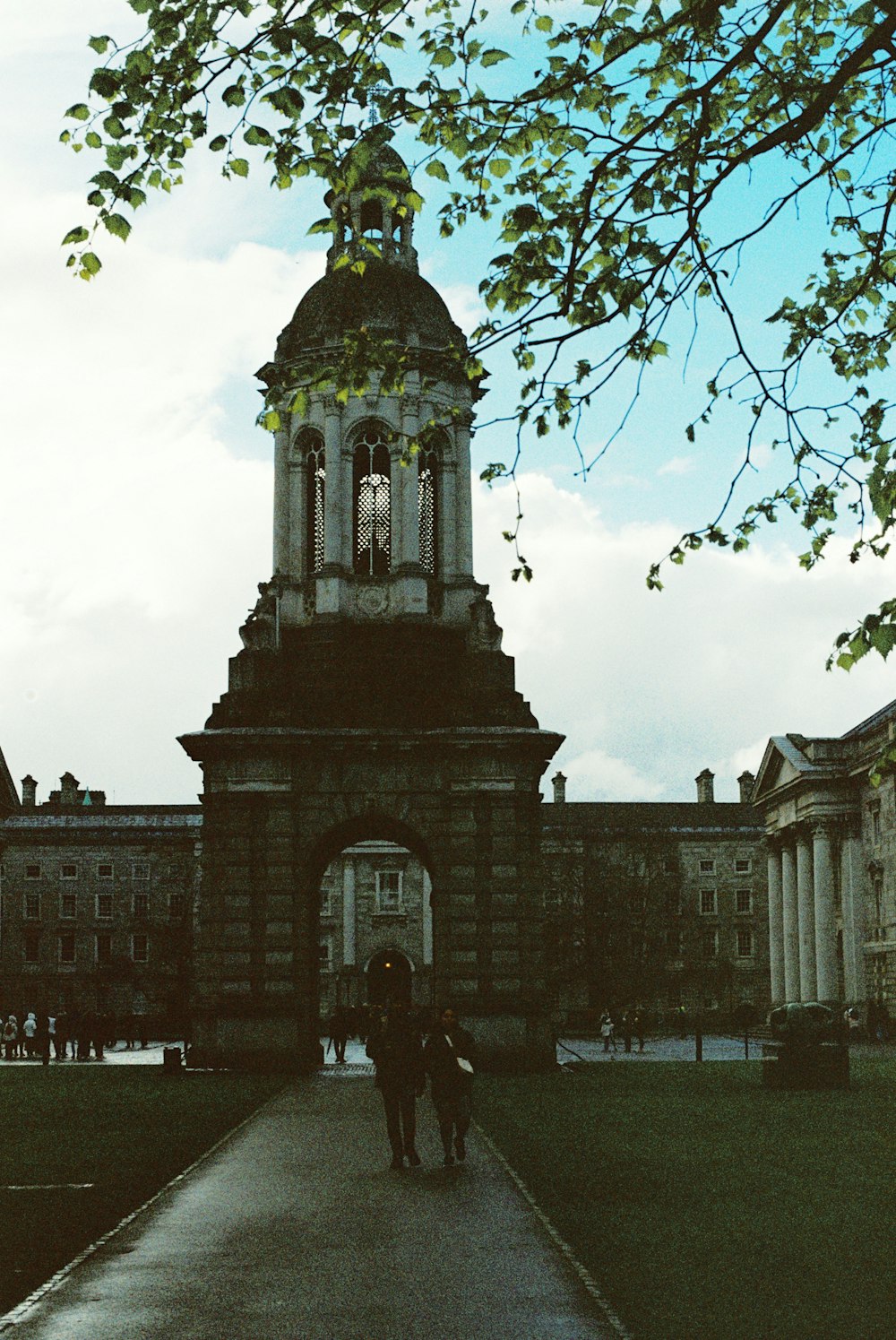 a tall building with a clock tower on top of it