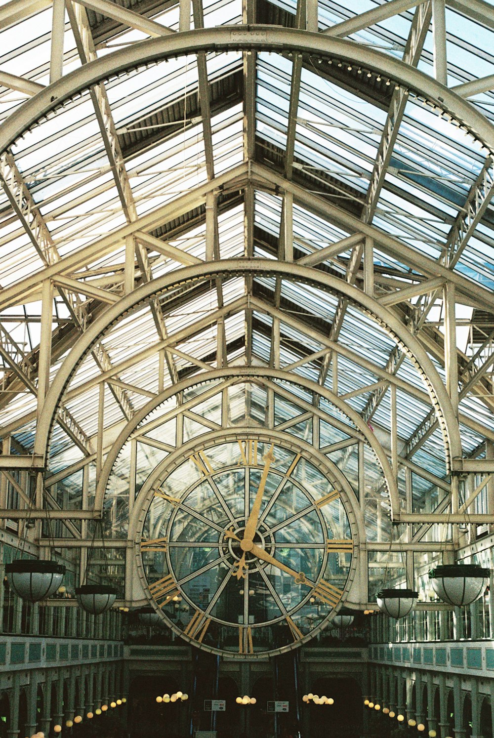 the inside of a building with a large clock inside of it