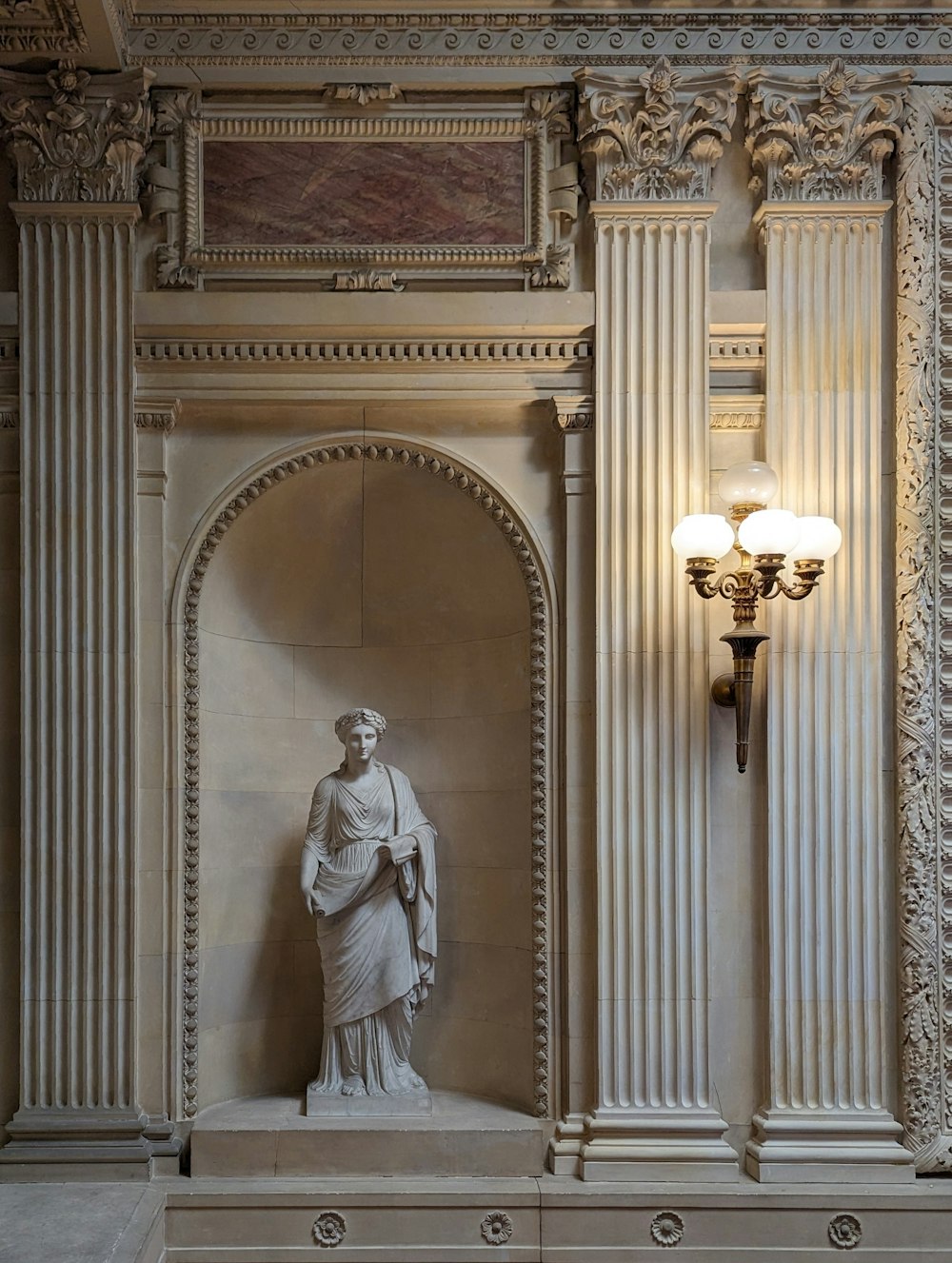a statue of a woman in a room