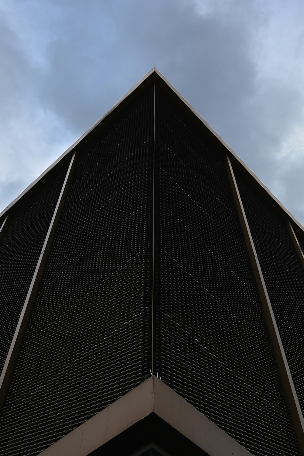 a tall building with a clock on the top of it