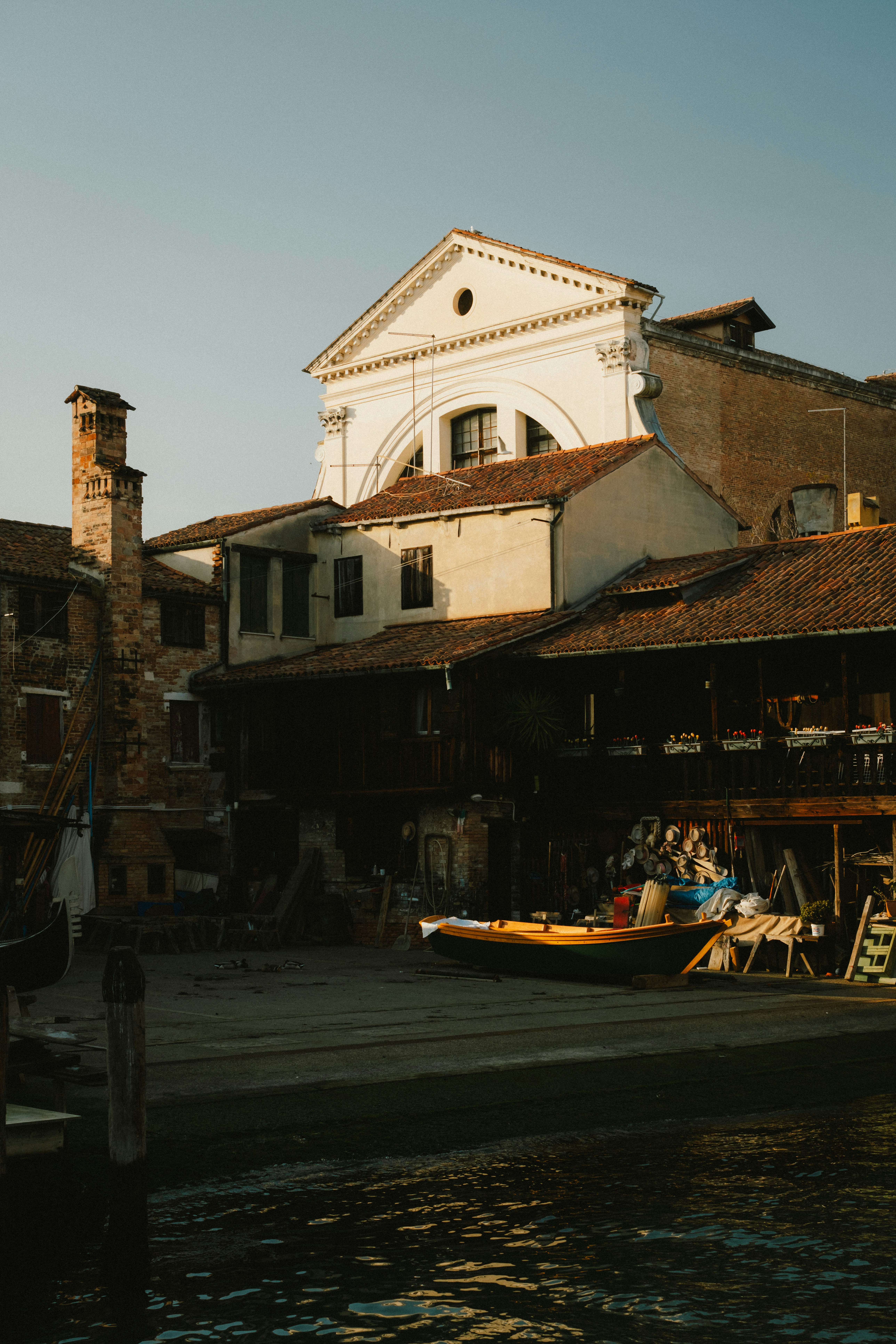 a boat is parked in front of a building