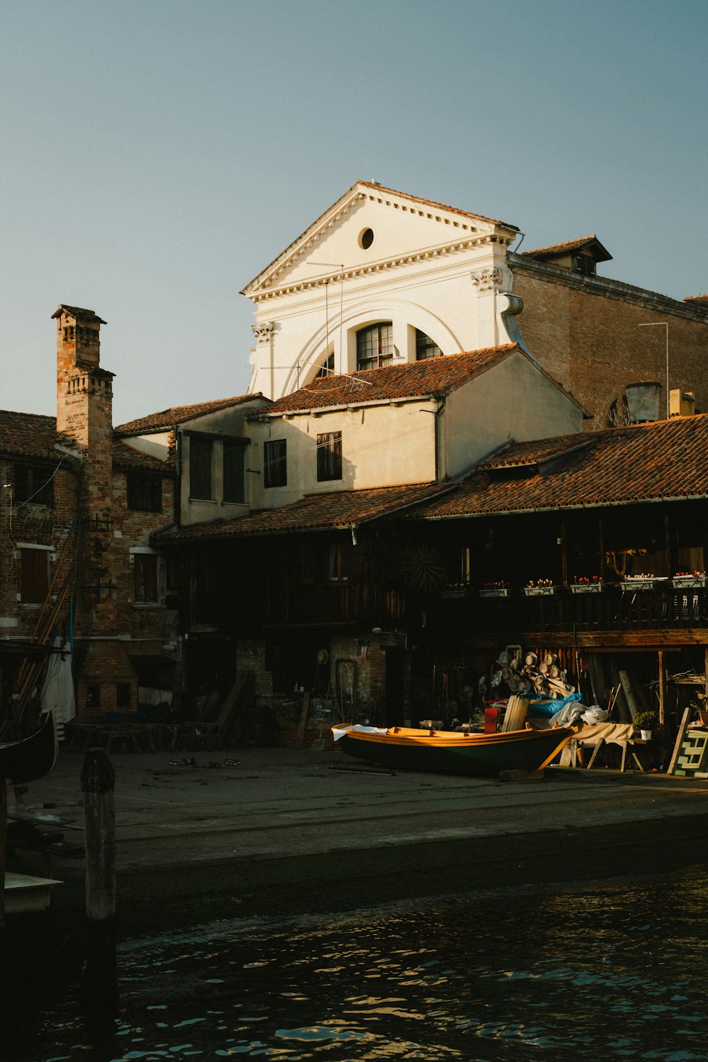 a boat is parked in front of a building