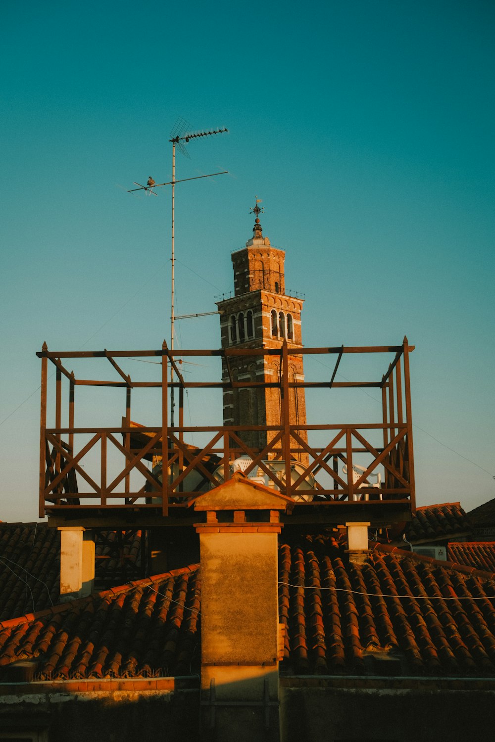 a tall clock tower sitting on top of a building