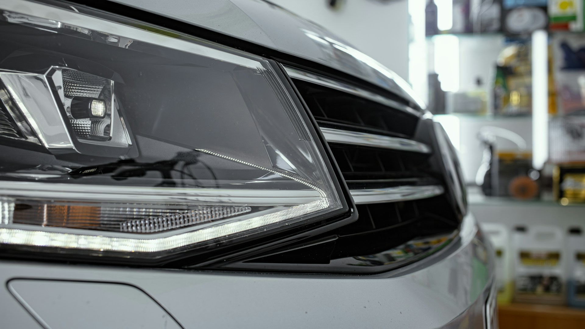 a close up of a headlight on a car