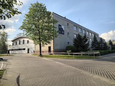 a building with a parking lot in front of it