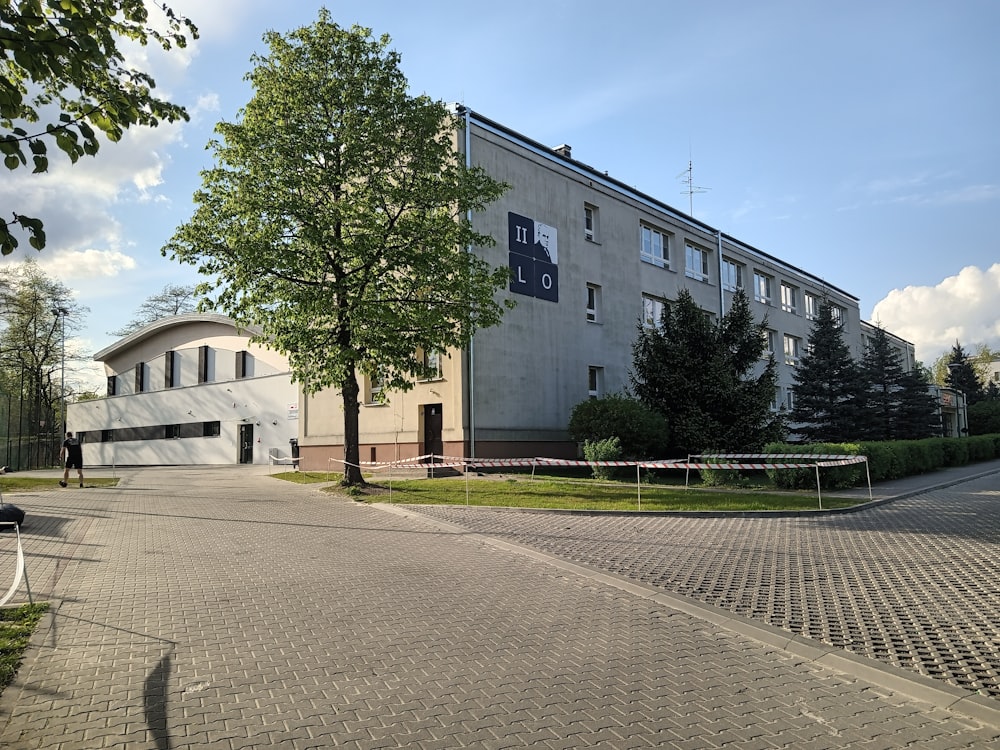 a building with a parking lot in front of it