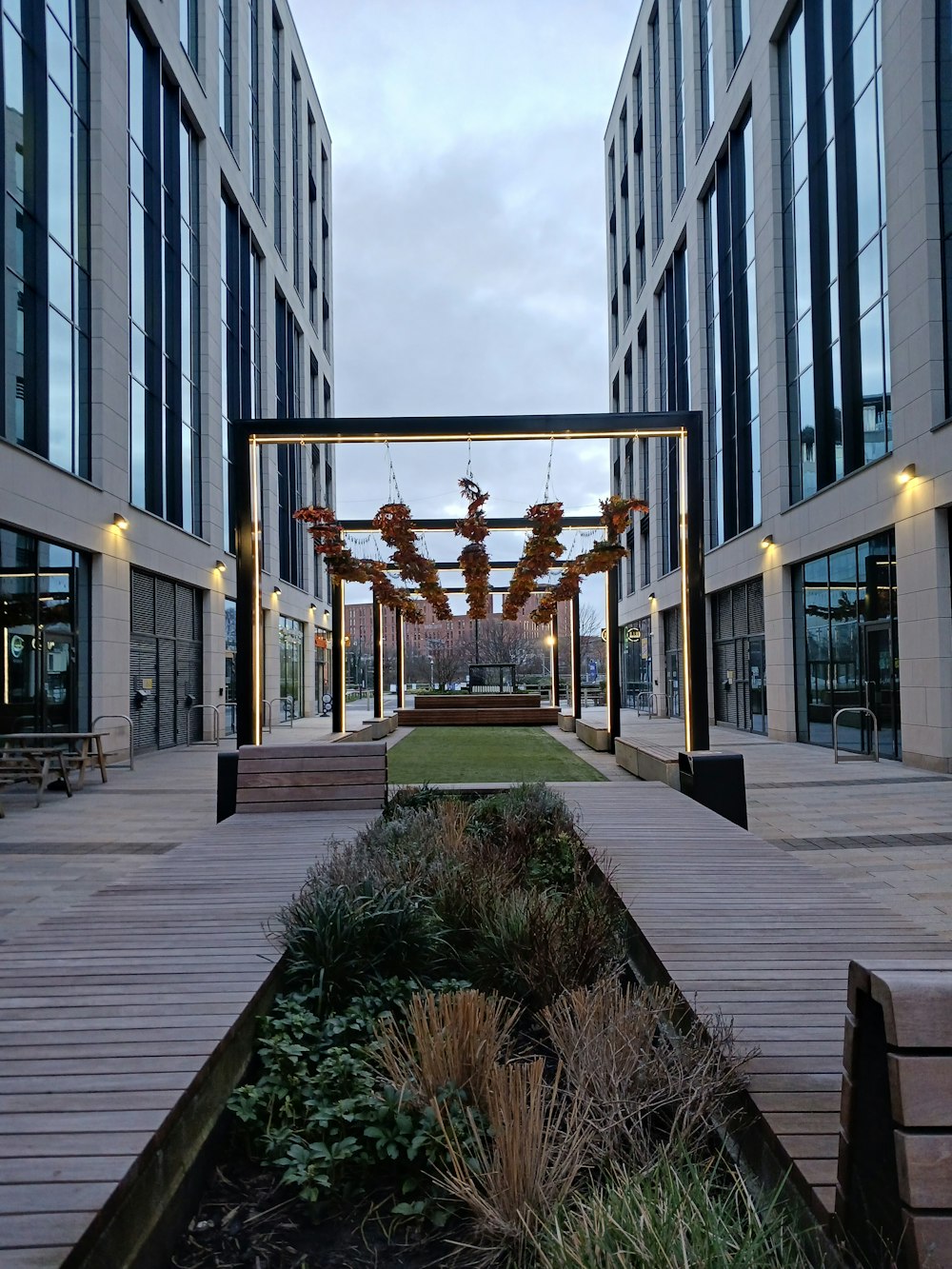 a view of a walkway in a large building