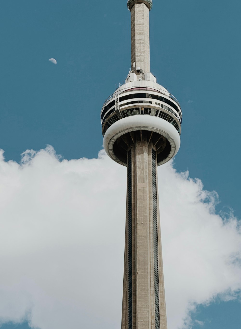 a tall tower with a clock on the top of it