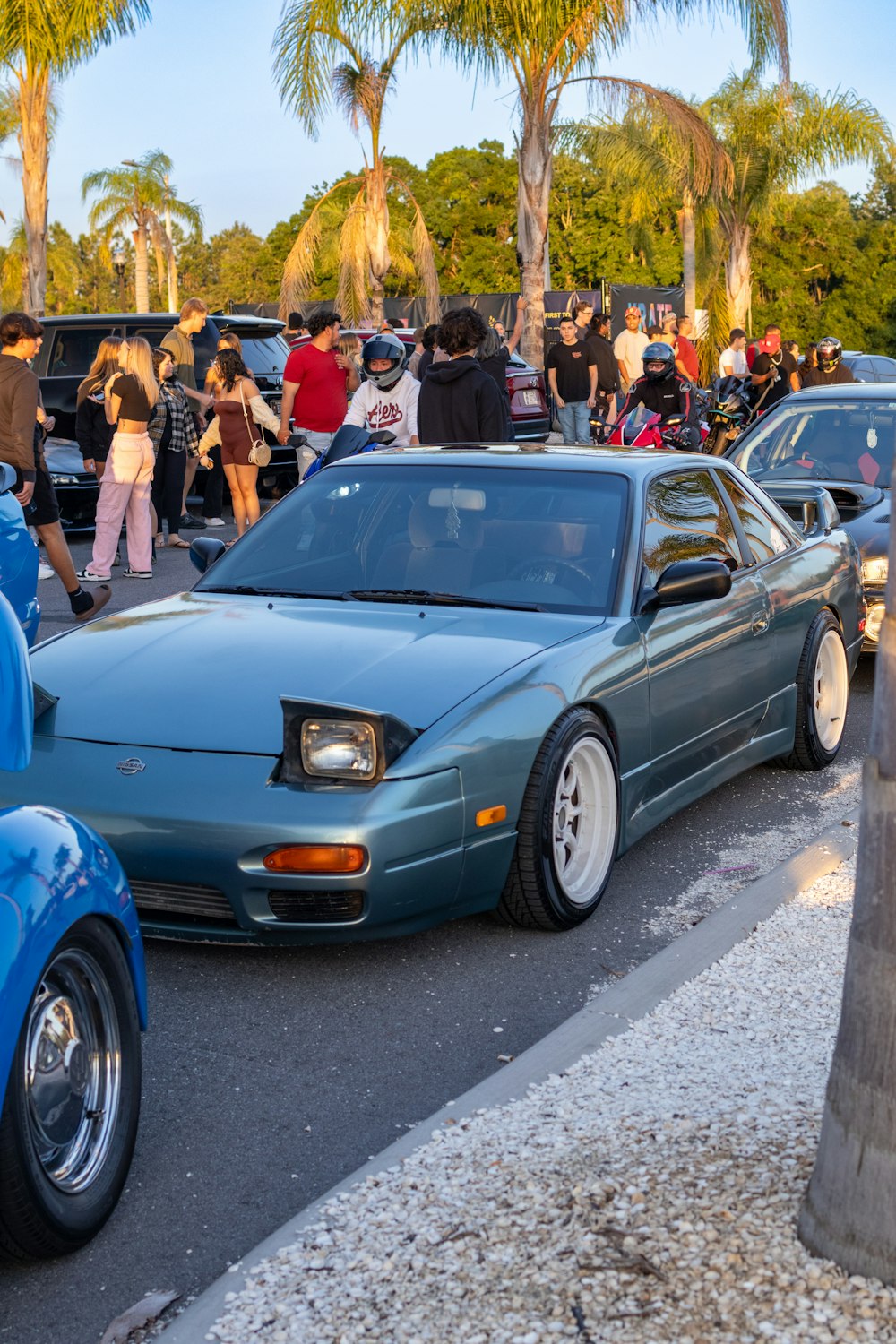 a group of cars parked on the side of a road