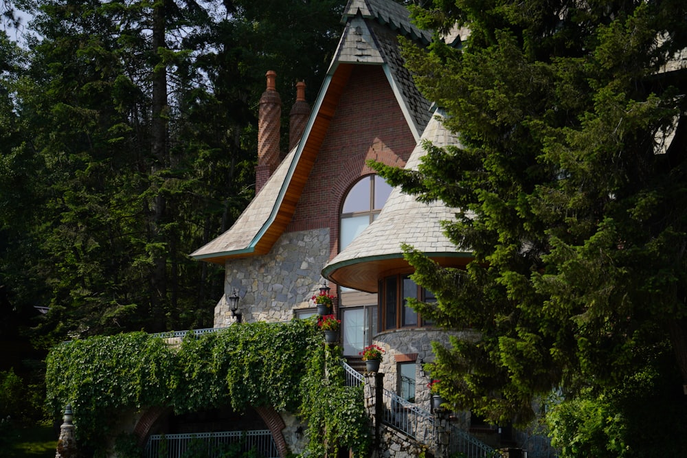 a house in the woods surrounded by trees