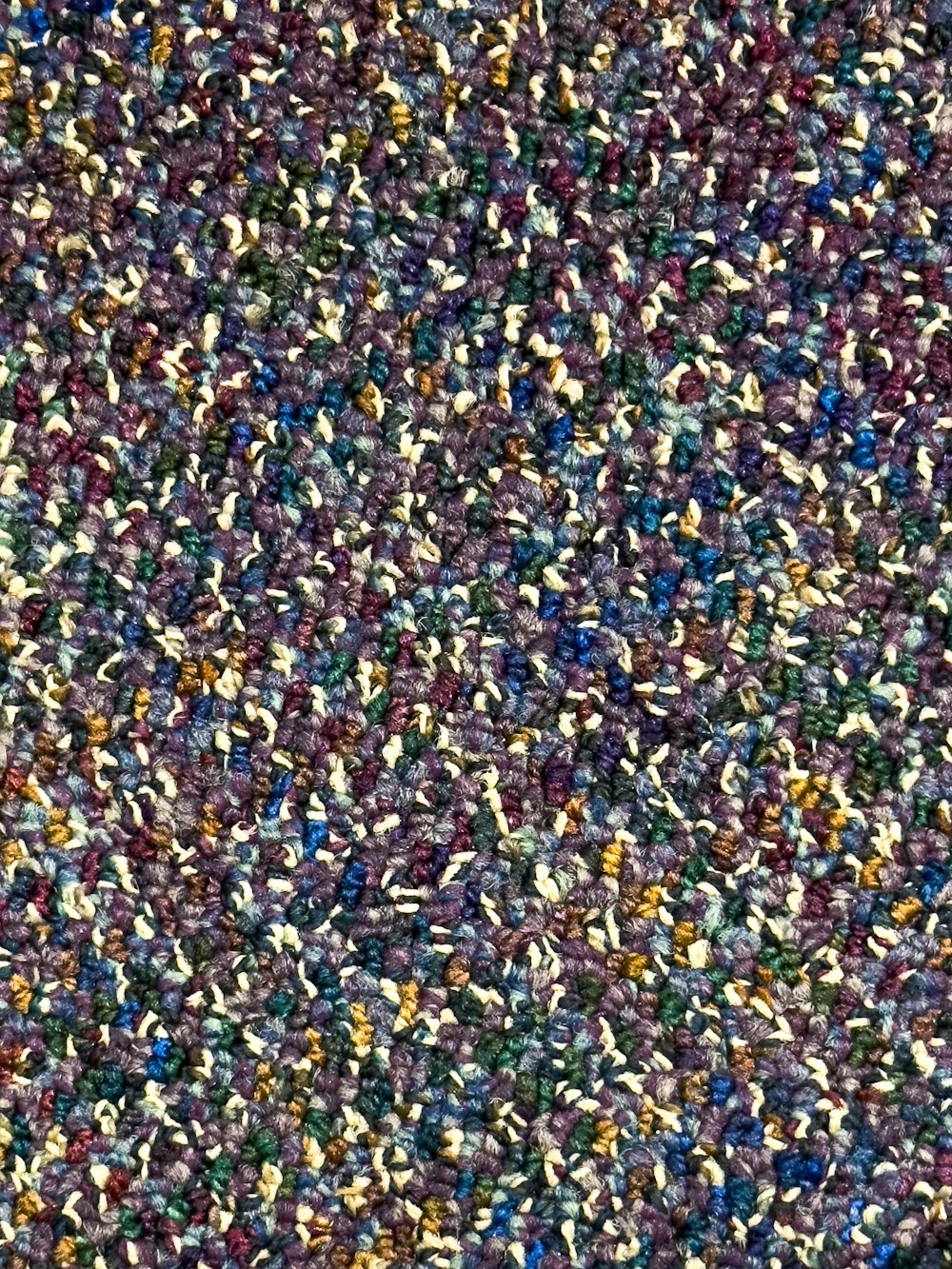 a close up view of a colorful carpet