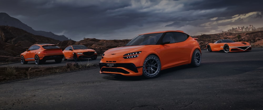 a group of orange sports cars parked on a road