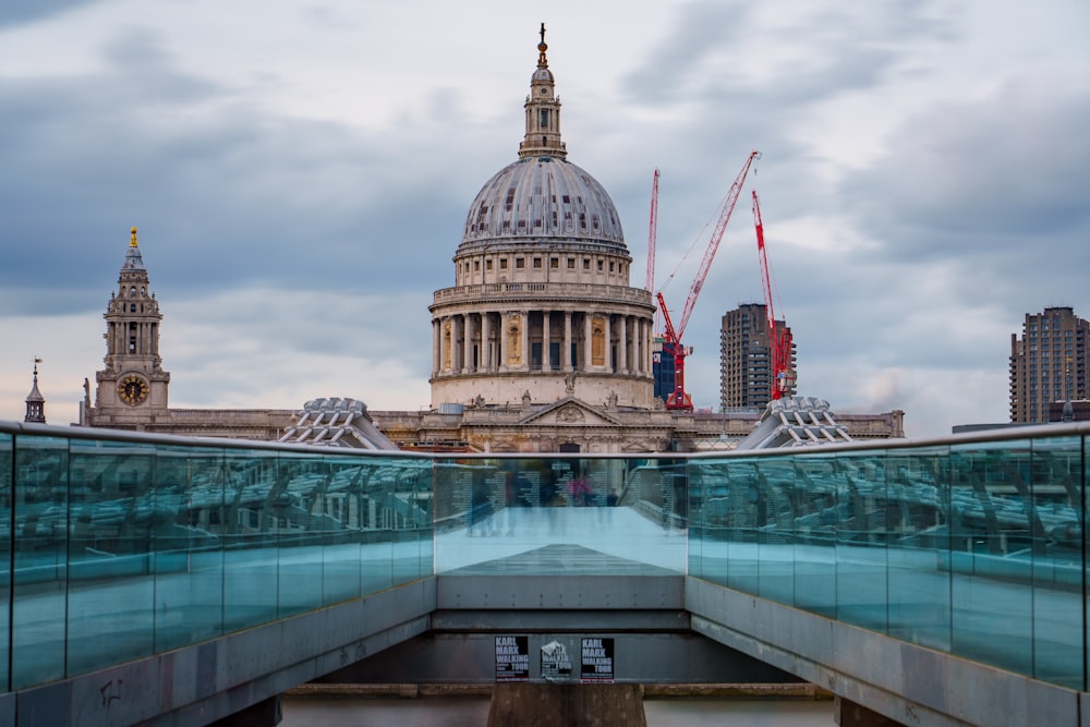 a bridge with a view of the dome of a building