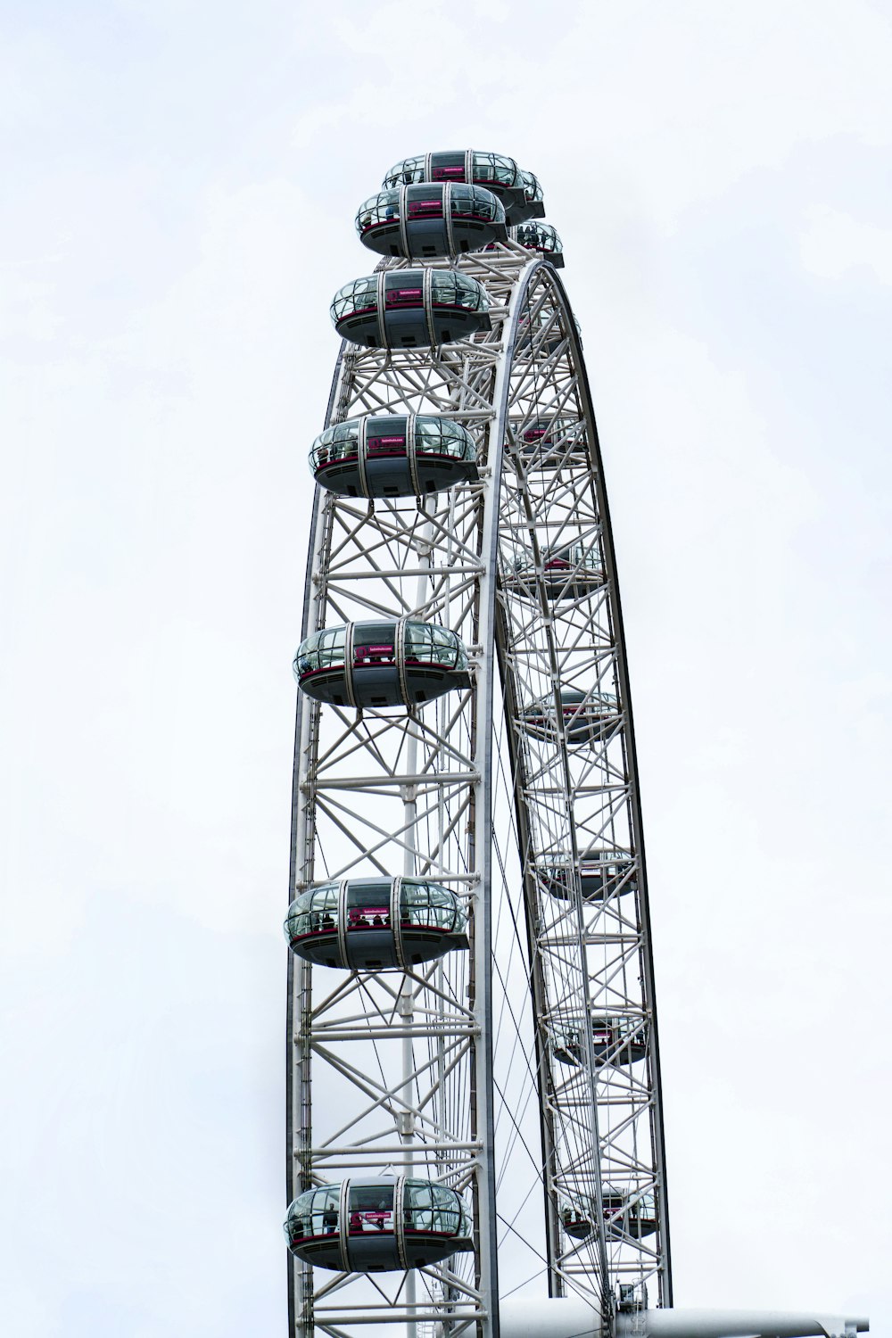 a ferris wheel with cars on top of it