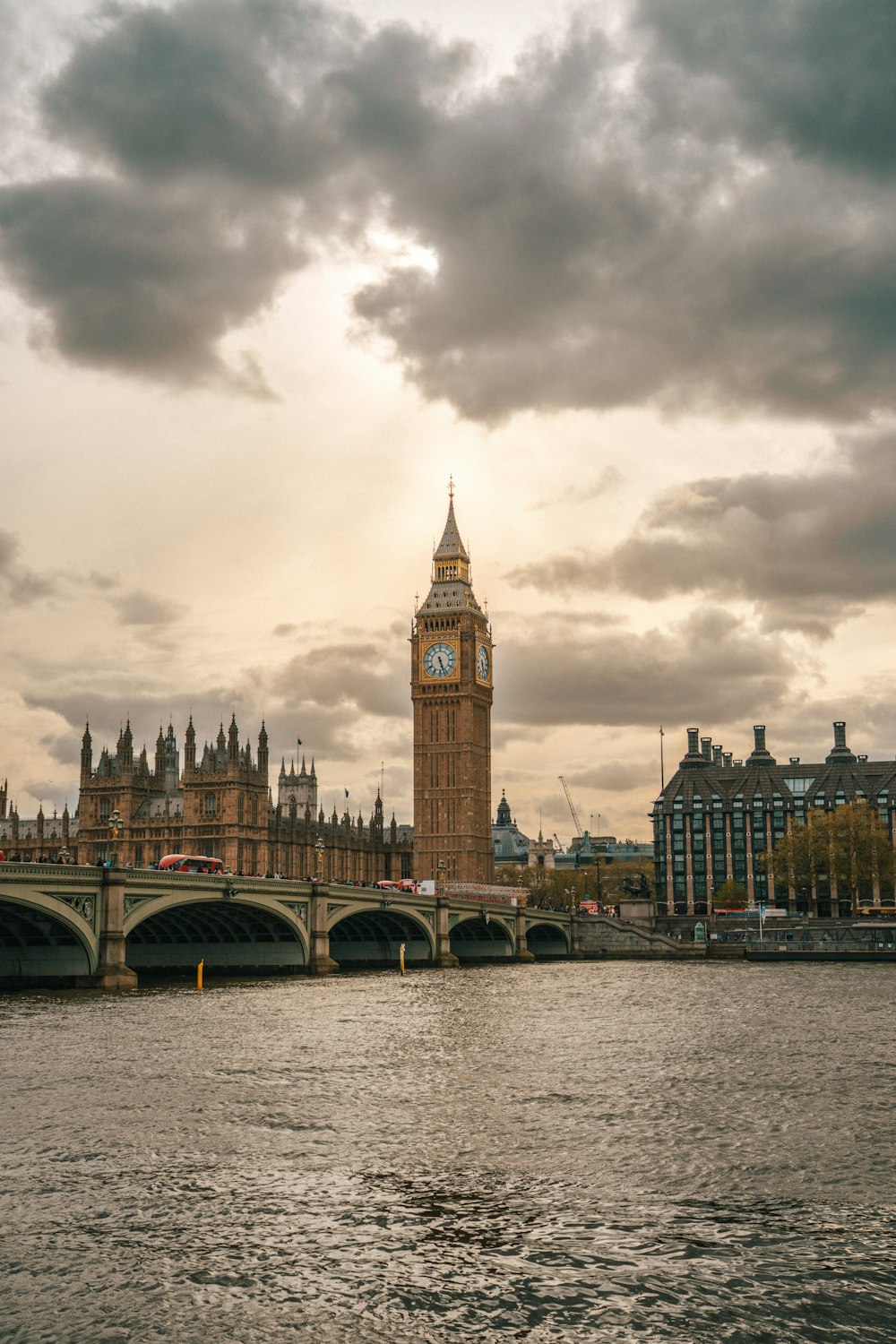 a large clock tower towering over the city of london