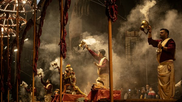 A group of men standing on top of a stage — Varanasi, India