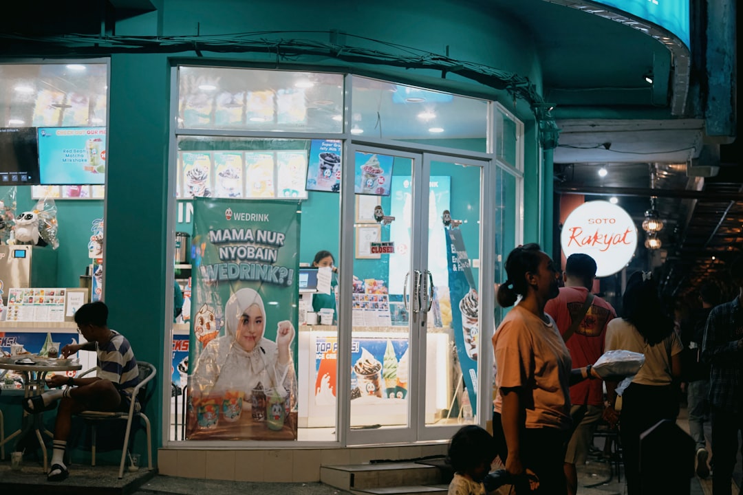 Street photography of people and stalls at night