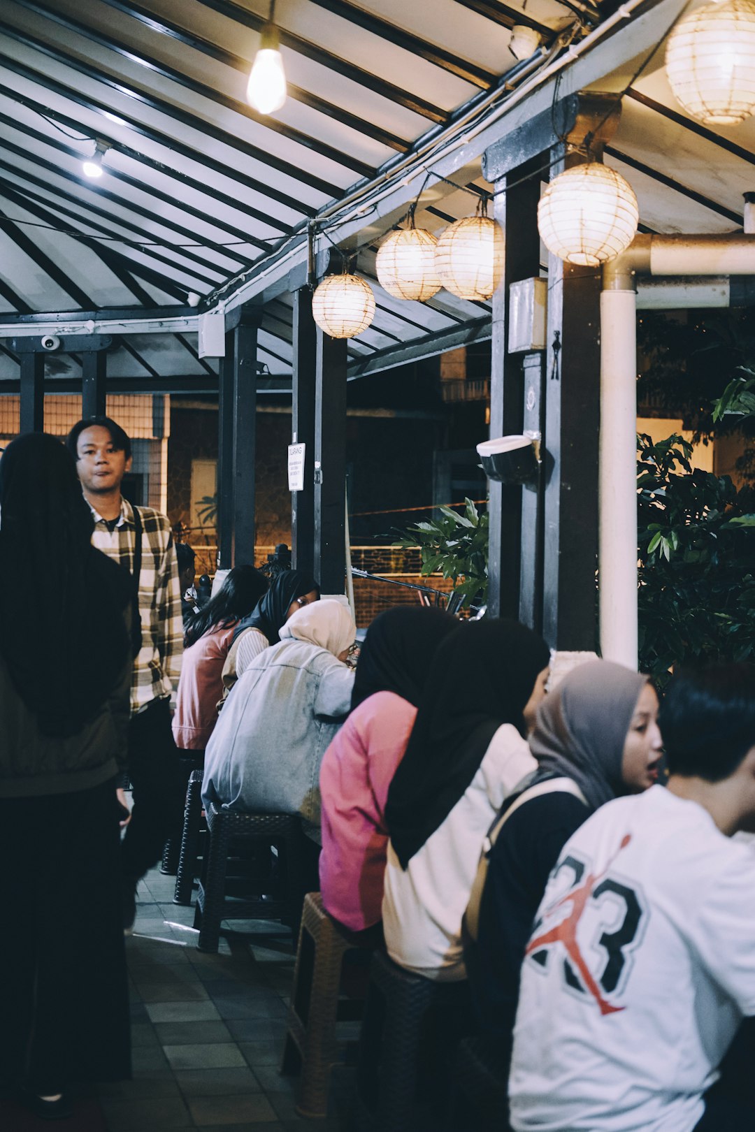 Street photography of people and stalls at night