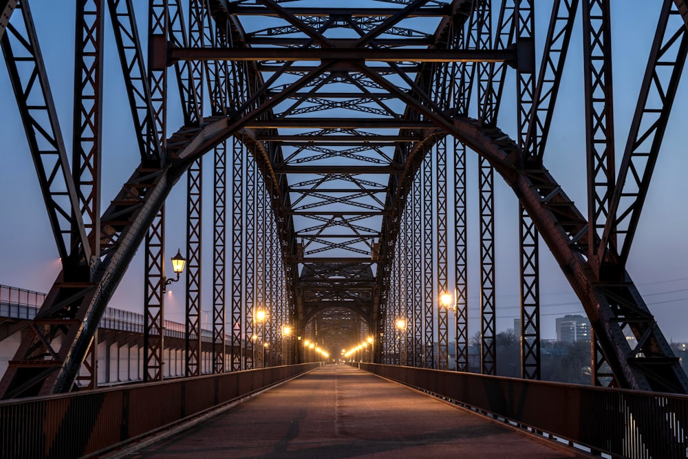 a bridge that has lights on the side of it