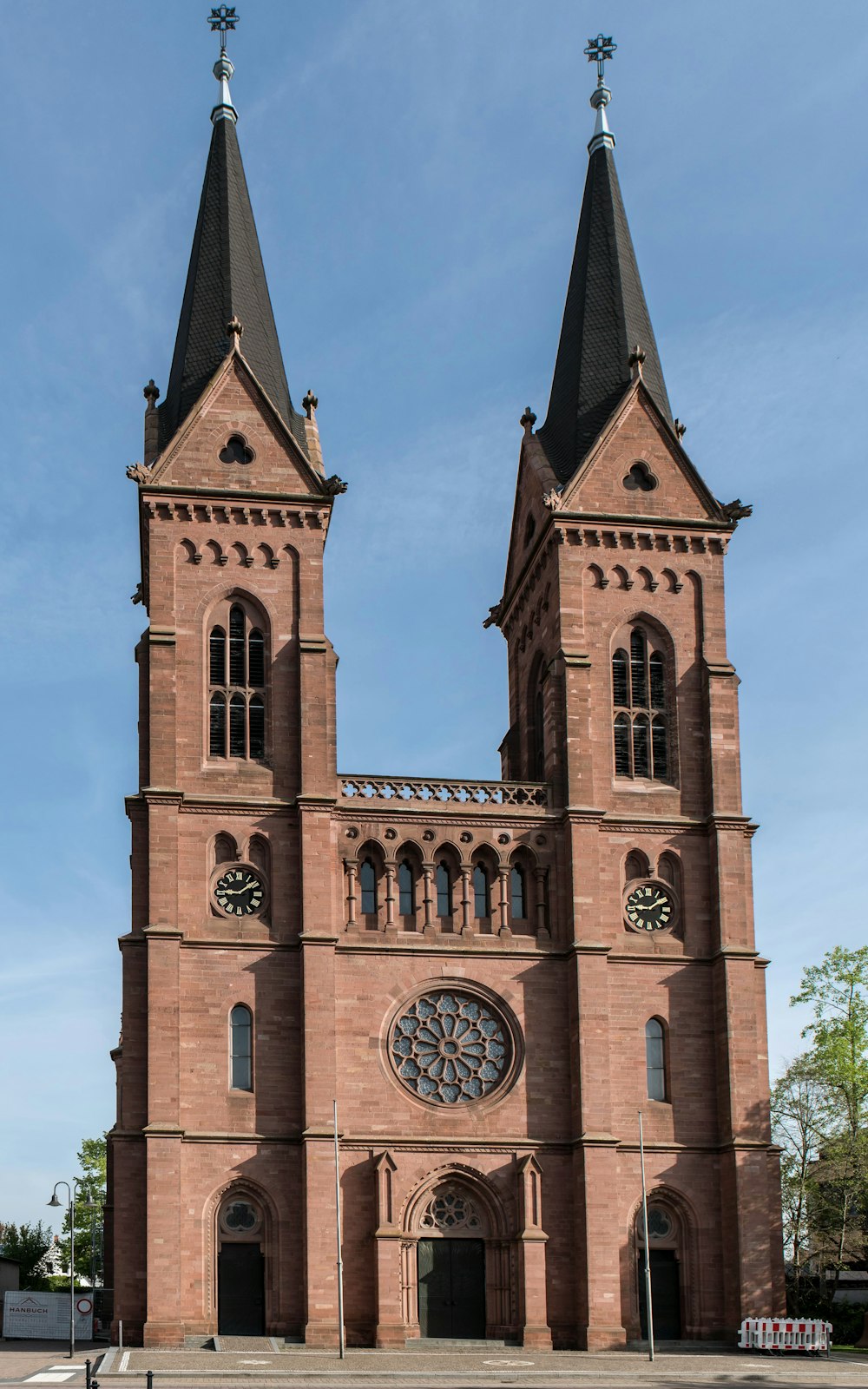 a large church with two towers and a clock