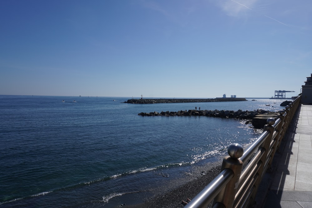 a view of a body of water from a bridge