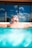 a man laying in a swimming pool wearing sunglasses