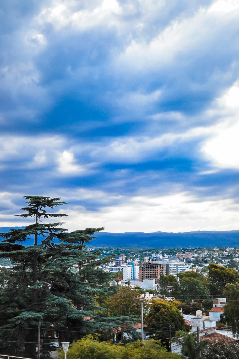 a view of a city from a hill