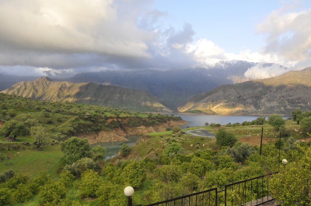 a scenic view of mountains and a lake