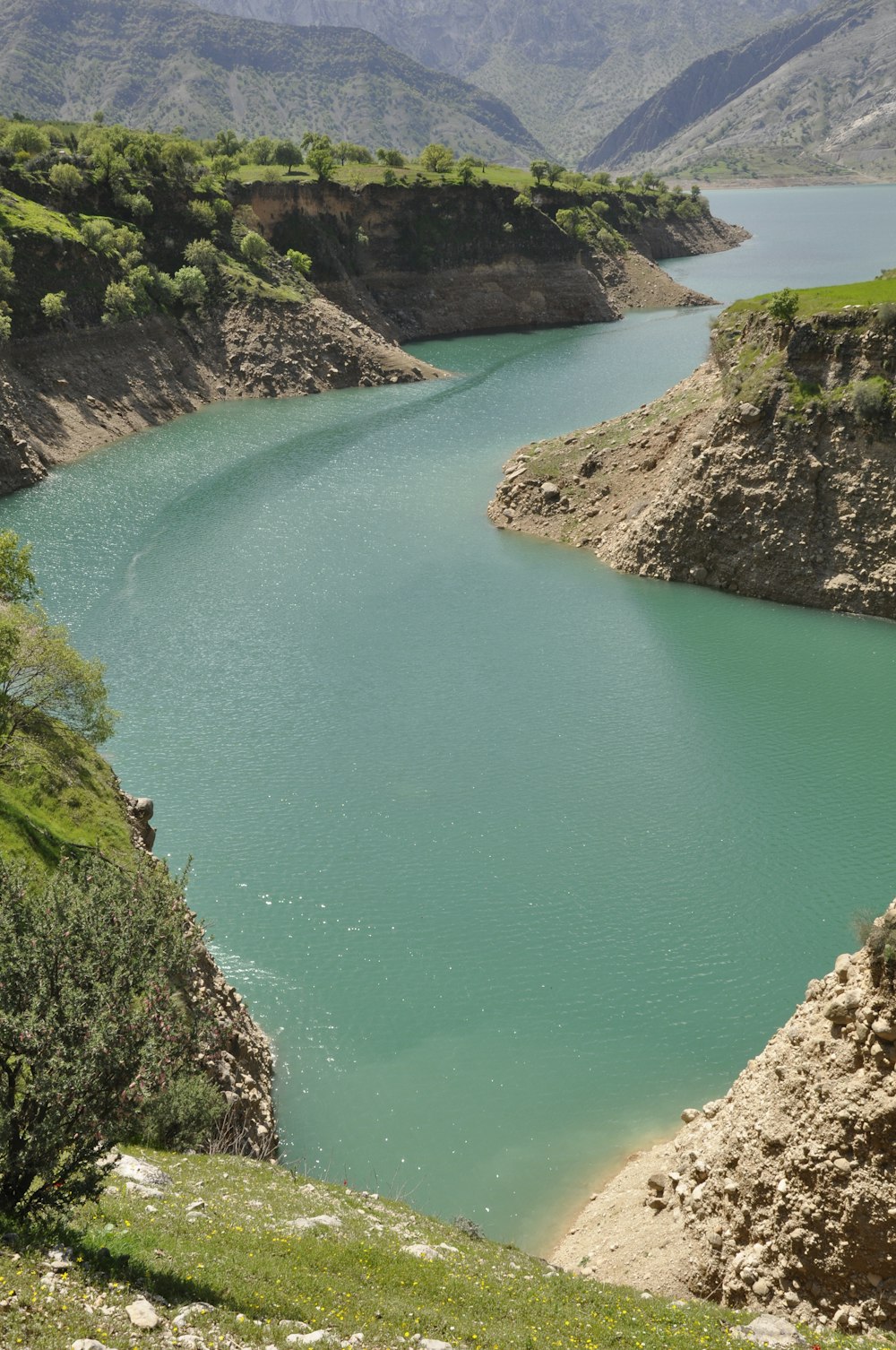 a large body of water surrounded by mountains