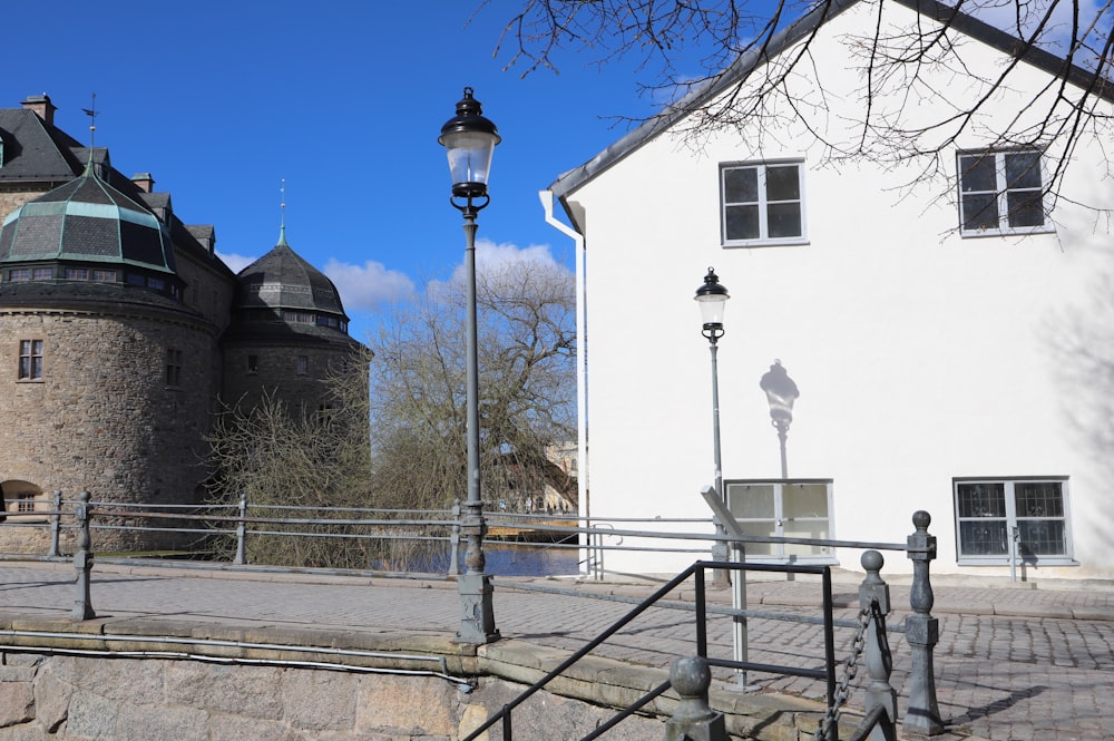 a large white building with a clock tower