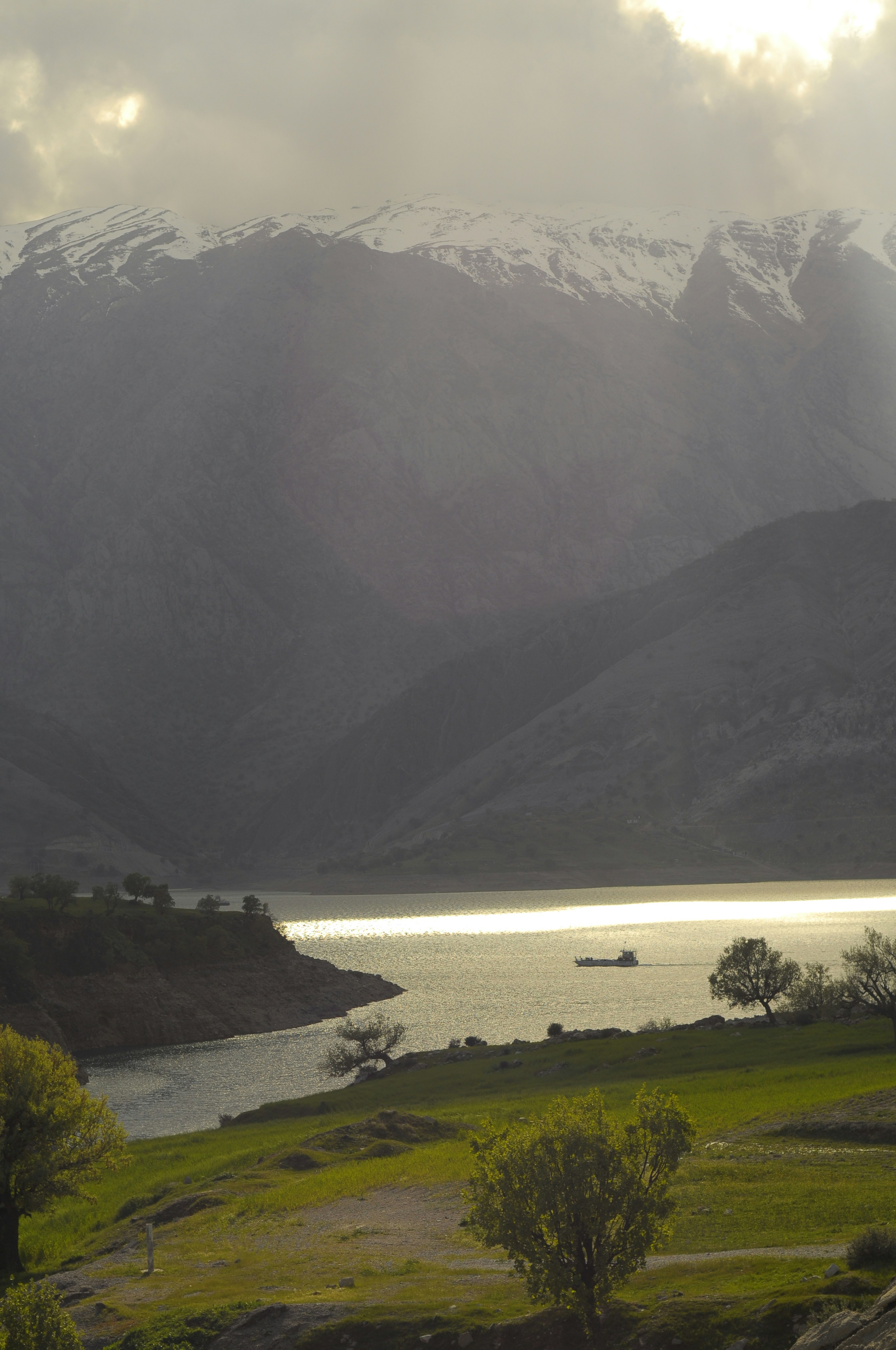 a large body of water surrounded by mountains