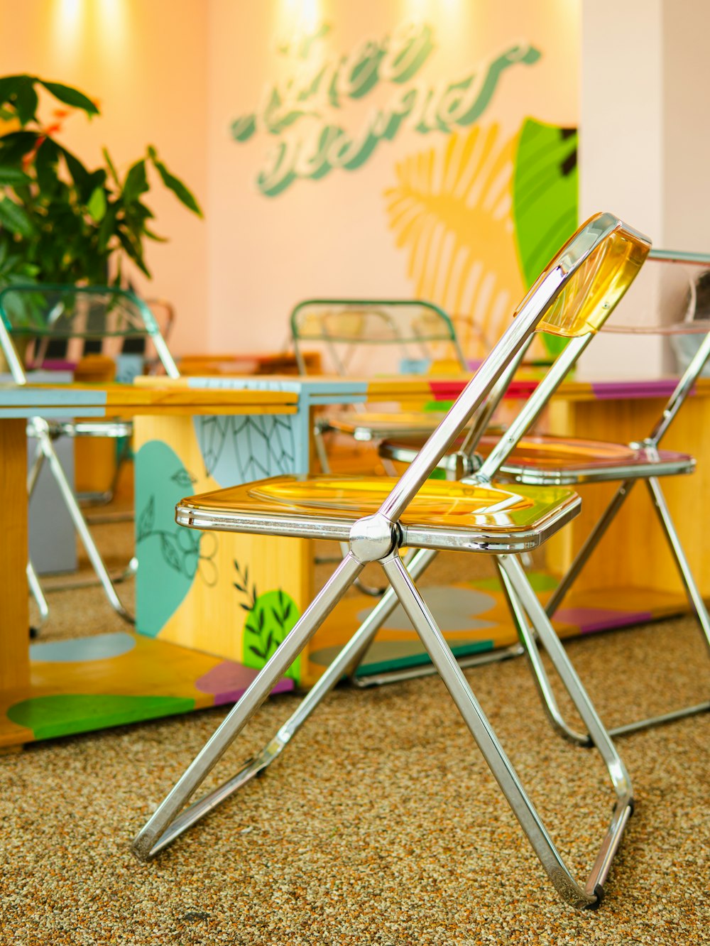 a couple of chairs sitting on top of a carpeted floor