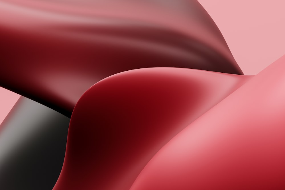 a close up of a red and black object