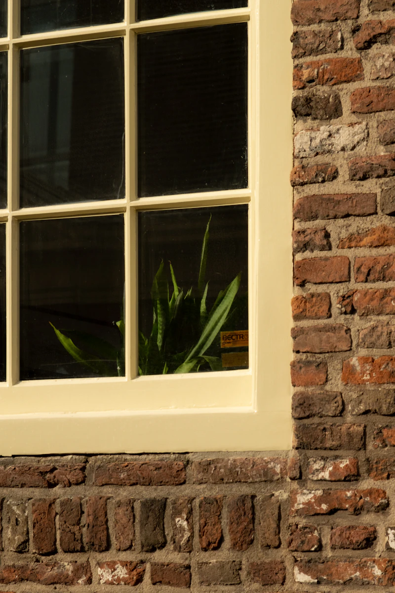White window on a brick building
