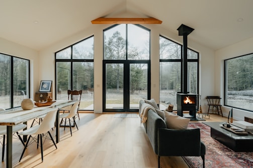 a living room filled with furniture and a fire place