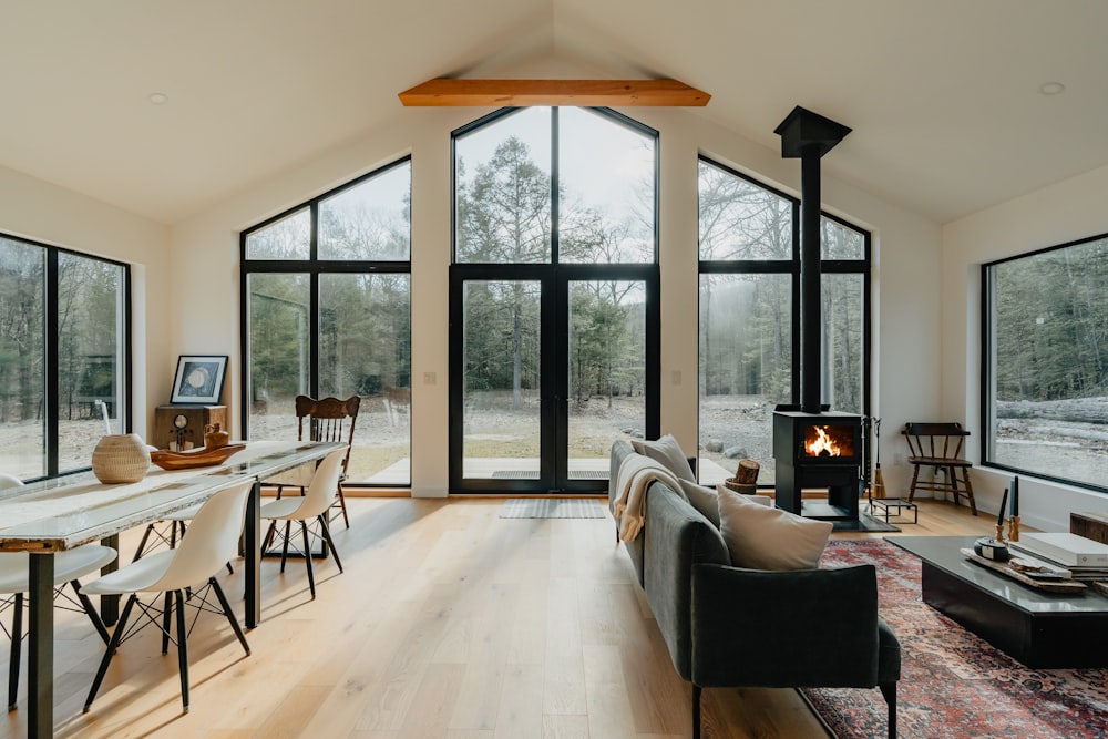 a living room filled with furniture and a fire place