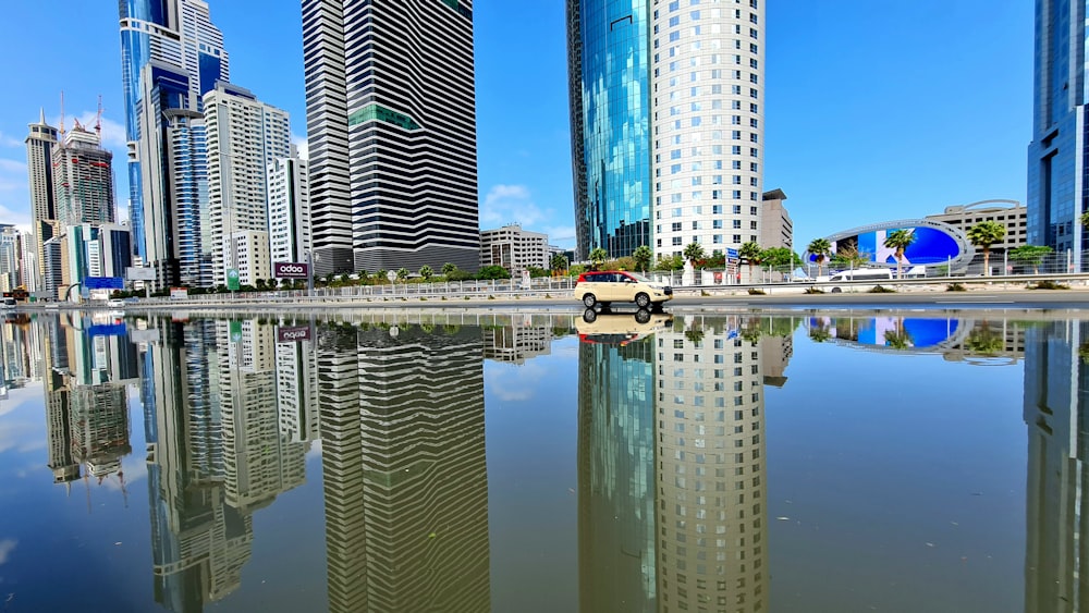 a body of water surrounded by tall buildings