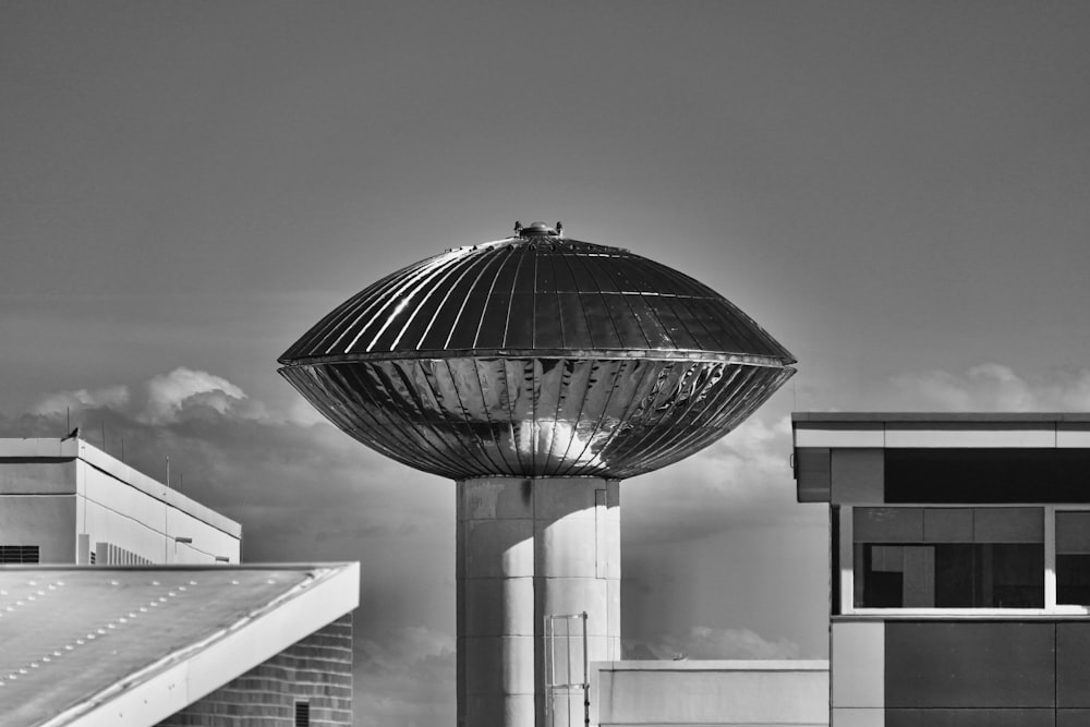 a black and white photo of a large metal object