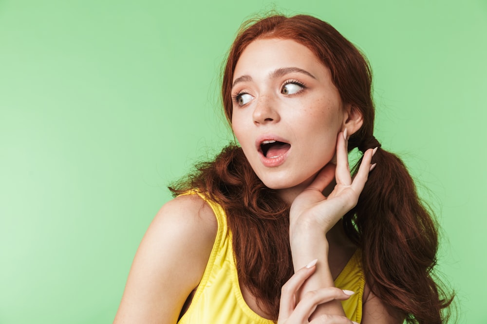 a woman with a surprised look on her face