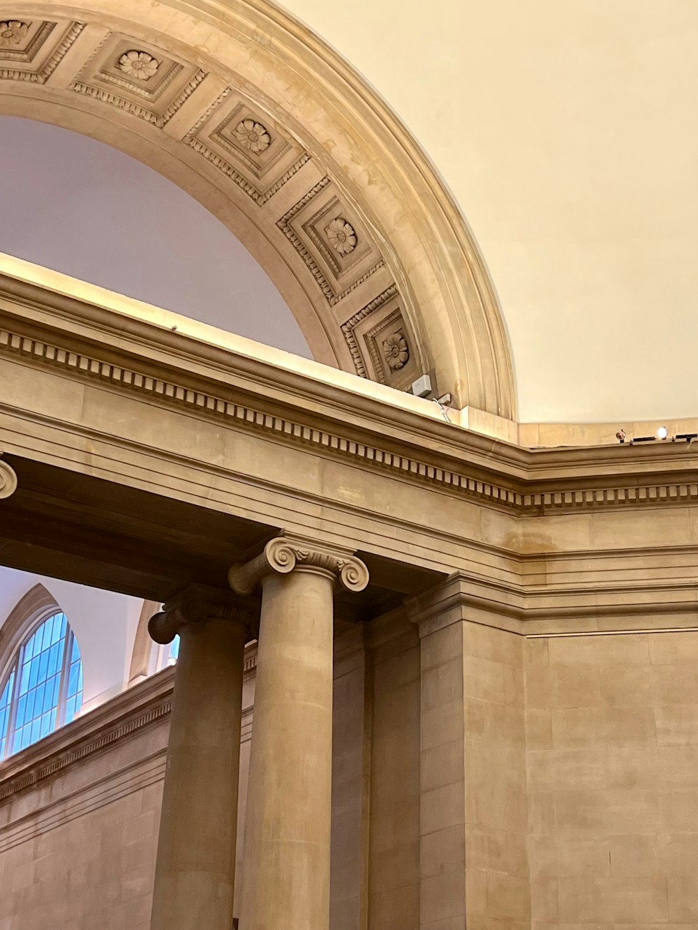 a clock is on the wall of a building